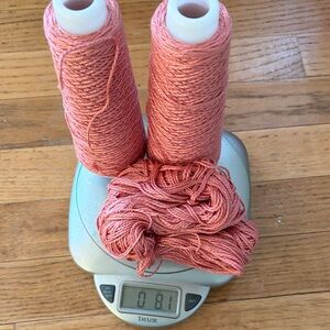 8.2 ounces of pearlized cotton pink yarn